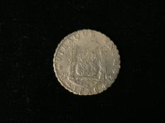 AN 18TH CENTURY SHIPWRECK RECOVERED COIN, TOGETHER WITH A CERTIFICATE OF ORIGIN STATING ITS RECOVERY