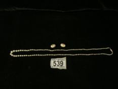A VINTAGE STRING OF PEARLS WITH 9 CARAT GOLD CLASP; STAMPED '9C'; PEARLS OF GRADUATED SIZE AND A