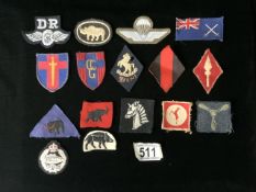 A QUANTITY OF MILITARY CLOTH BADGES INCLUDING BRITISH ARMY OF THE RHINE, THE CONTROL COMMISSION