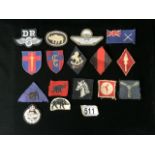 A QUANTITY OF MILITARY CLOTH BADGES INCLUDING BRITISH ARMY OF THE RHINE, THE CONTROL COMMISSION