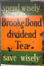 VINTAGE ENAMEL ADVERTISING SIGN 'SPEND WISELY BROOKE BOND DIVIDEND TEA SAVE WISELY'; 76 X 51CM