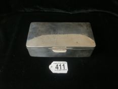 A STERLING SILVER CIGARETTE BOX BY CLARK & SEWELL; CHESTER 1918; RECTANGULAR FORM; MONOGRAMMED;