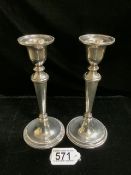 A PAIR OF STERLING SILVER CANDLESTICKS BY BROADWAY & CO; BIRMINGHAM 1989; CIRCULAR FORM, BEAD