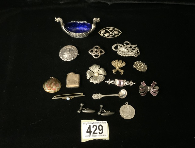 A QUANTITY OF BROOCHES AND A NORWEIGAN SALT CELLAR INCLUDING A CELTIC BROOCH, FLORAL EXAMPLES,