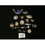 A QUANTITY OF BROOCHES AND A NORWEIGAN SALT CELLAR INCLUDING A CELTIC BROOCH, FLORAL EXAMPLES,