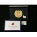 A BOXED COMMEMORATIVE PRINCESS DIANA 20TH ANNIVERSARY GOLD PLATED PHOTOGRAPHIC COIN; ISSUED BY THE