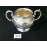 A VICTORIAN STERLING SILVER TWO HANDLED SUGAR BOWL BY MARTIN & HALL; LONDON 1882, SCROLL HANDLES,