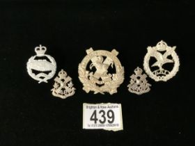 FIVE METAL MILITARY CAP BADGES COMPRISING LIVERPOOL SCOTTISH, EDMONTON REGIMENT, ROYAL TANK REGIMENT