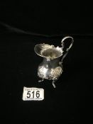 A VICTORIAN STERLING SILVER CREAM JUG BY HAWKSWORTH, EYRE & CO; SHEFFIELD 1898, BALUSTER FORM,