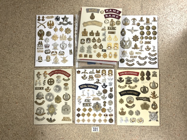 A QUANTITY OF METAL AND CLOTH CAP BADGES, BUTTONS AND SHOULDER TITLES INCLUDING; ROYAL ARTILLERY,