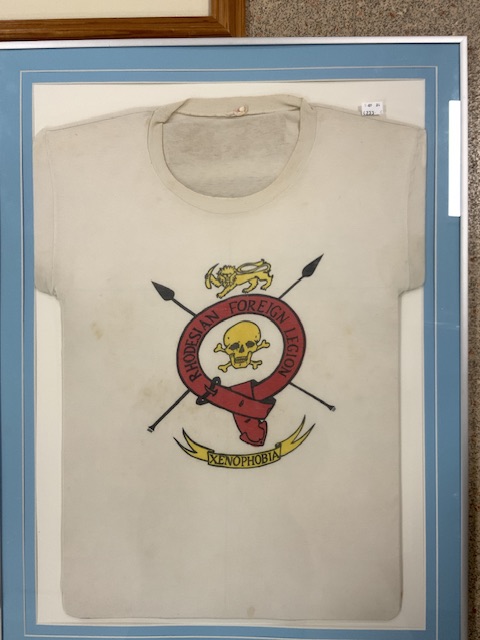 RHODESIAN ARMY 'TERRORISM STOPS HERE' PUBLICITY POSTER WITH TWO ORIGINAL RHODESIAN T SHIRTS; ALL - Image 3 of 4