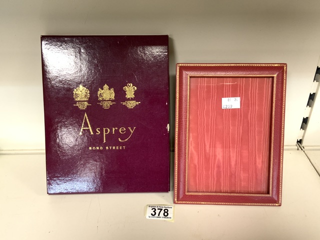 BOXED ASPREY RED LEATHER AND GILT PHOTO FRAME; 21 X 16CM