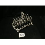 A VICTORIAN STERLING SILVER 7 BAR TOASTRACK BY REILY & STORER; LONDON 1847; DOUBLE LOOP BARS; SCROLL