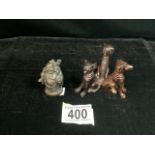 ANTIQUE MODEL OF THREE DOGS IN A SEATED POSITION; COJOINED BY TAILS; HEIGHT 5CM AND A SMALL MODEL OF
