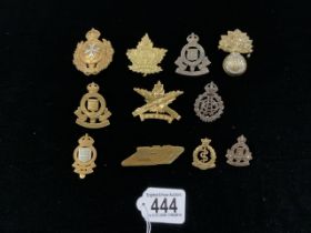 A QUANTITY OF MILITARY METAL CAP BADGES INCLUDING; ROYAL ARMY ORDNANCE CORPS, CANADA, ROYAL ARMY