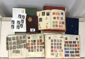 A QUANTITY OF VINTAGE STAMP ALBUMS AND POSTAGE STAMPS; VARIOUS COUNTRIES AND DATES