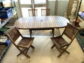 TEAK GARDEN TABLE WITH FOUR FOLDING GARDEN CHAIRS