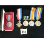 A COLLECTION OF MILITARY MEDALS AND RIBBONS INCLUDING; A BOXED IMPERIAL SERVICE MEDAL; STAMPED '