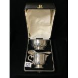 A CASED STERLING SILVER CHRISTENING SET; COMPRISING; BOWL, JUG AND RATTAIL SPOON; BY ROBERT
