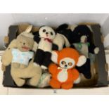 A QUANTITY OF VINTAGE STUFFED ANIMALS AND TEDDY BEARS INCLUDING, RABBITS, PANDA, LAMB, DOGS AND