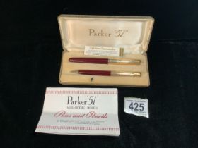A BOXED PAIR OF PARKER PEN AND PROPELLING PENCIL IN PRESENTATION CASE; WITH PAPERWORK