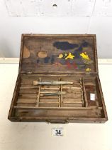 A VINTAGE WOODEN ARTISTS TRAVELLING PAINT BOX WITH REMOVABLE PALETTE