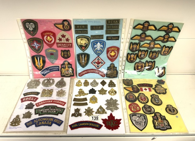 QUANTITY OF MILITARY CANADIAN CLOTH AND METAL BADGES
