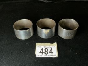 SET OF THREE HEAVY HALLMARKED SILVER NAPKIN RINGS; DATED 1922/24; BY H.PHILLIPS; 92 GRAMS