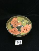 MOORCROFT; A GREEN AND PINK HIBISCUS BOWL; DIAMETER 16CM