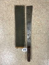 MILITARY MACHETTE AND CANVAS SHEATH DATED 1945 BLADE LENGTH 36CM