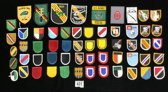 A QUANTITY OF MILITARY CLOTH BADGES INCLUDING; U.S ARMY SPECIAL FORCES, DELTA, USA SPECIAL FORCES