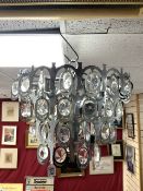 A MID-CENTURY ITALIAN DESIGN CHROME CHANDELIER WITH GLASS DROPLETS