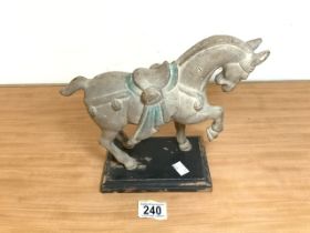 PAINTED CAST IRON TANG STYLE MODEL OF A HORSE ON RECTANGULAR PLINTH; 24CM.