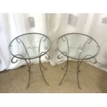PAIR OF METAL AND GLASS GARDEN TABLES; 46 X 70CM
