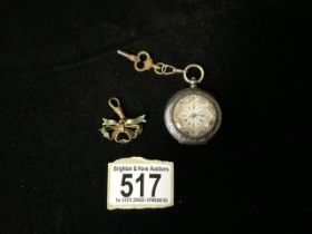 AN ANTIQUE SWISS SILVER CASED FOB WATCH; STAMPED '0.935'; ENGRAVED DECORATION; ENAMEL FACE WITH