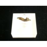 18 CARAT GOLD RING DECORATED WITH DIAMONDS; 1.9 GRAMS; SIZE J.5