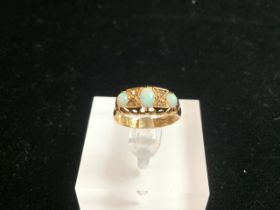 ANTIQUE 18 CARAT GOLD RING WITH A TRIO OF FIRE OPALS BY HENRY WILLLIAMSON LTD; 2.8 GRAMS; SIZE K