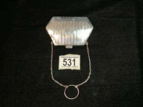 A STERLING SILVER COIN PURSE ON CHAIN; HALLMARKS RUBBED; DATE LETTER r; SHAPED FORM WITH ENGRAVED