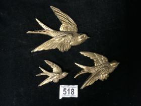 A SET OF THREE VINTAGE FLYING BIRD WALL PLAQUES BY C & A; MODELLED AS SWALLOWS; LENGTH OF LARGEST