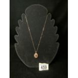 375 GOLD AND PLATINUM LOCKET WITH A 375 GOLD NECKLACE; 18 INCH; 2.4 GRAMS