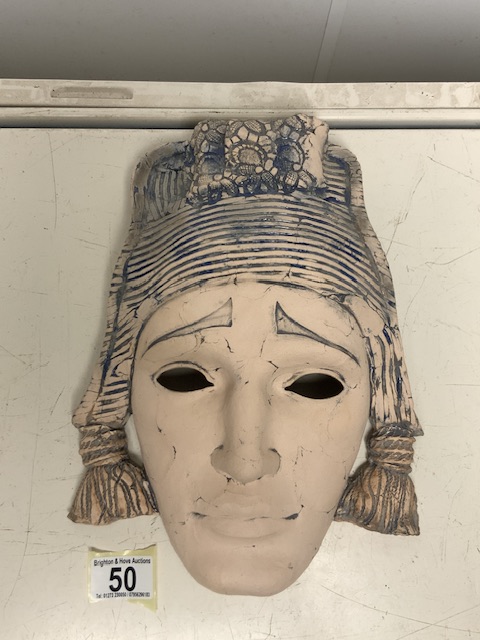 A PLASTER WALL HANGING MASK; POSSIBLY GREEK / EASTERN EUROPEAN; MODELLED AS A FACE IN TRADITIONAL