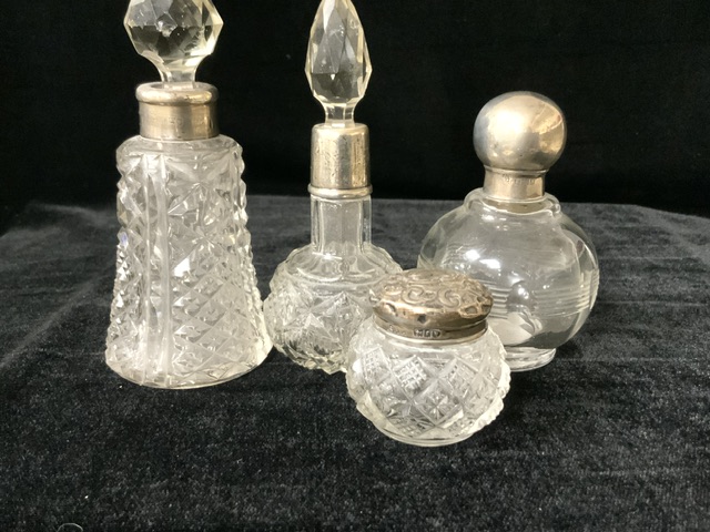 FOUR ANTIQUE GLASS AND SILVER SCENT BOTTLES / VANITY JAR, COMPRISING; A CUT GLASS EXAMPLE; LONDON - Image 2 of 2