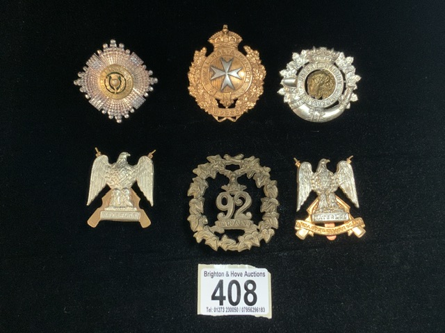A QUANTITY OF MILITARY METAL CAP BADGES INCLUDING; ROYAL SCOTS DRAGOONS, ROYAL MALTA AND OTHERS