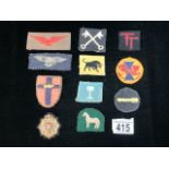 A QUANTITY OF MILITARY CLOTH BADGES INCLUDING; ROYAL AIR FORCE AND OTHERS