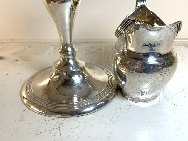 WEIGHTED HALLMARKED SILVER SQUAT CANDLESTICK CHESTER; DATED 1910; 11 CM DIAMETER WITH A HALLMARKED - Image 2 of 2