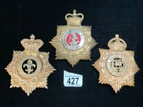 THREE MILITARY METAL CAP / BELT BADGES, SOUTH WALES BORDERERS, KINGS AND WEST RIDING