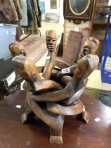 VINTAGE WOODEN AFRICAN STAND CARVED AS FIGURES
