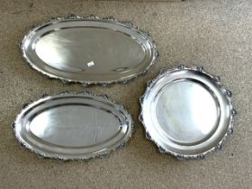 THREE QUALITY SILVER-PLATED PLATTERS; LARGEST 62CM