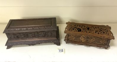 TWO WOODEN BOXES; ONE CARVED; THE OTHER FRETWORKED; LARGEST 33 X 16CM