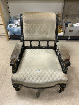 1930S EBONISED FRAMED ARMCHAIR ON ORIGINAL CASTORS